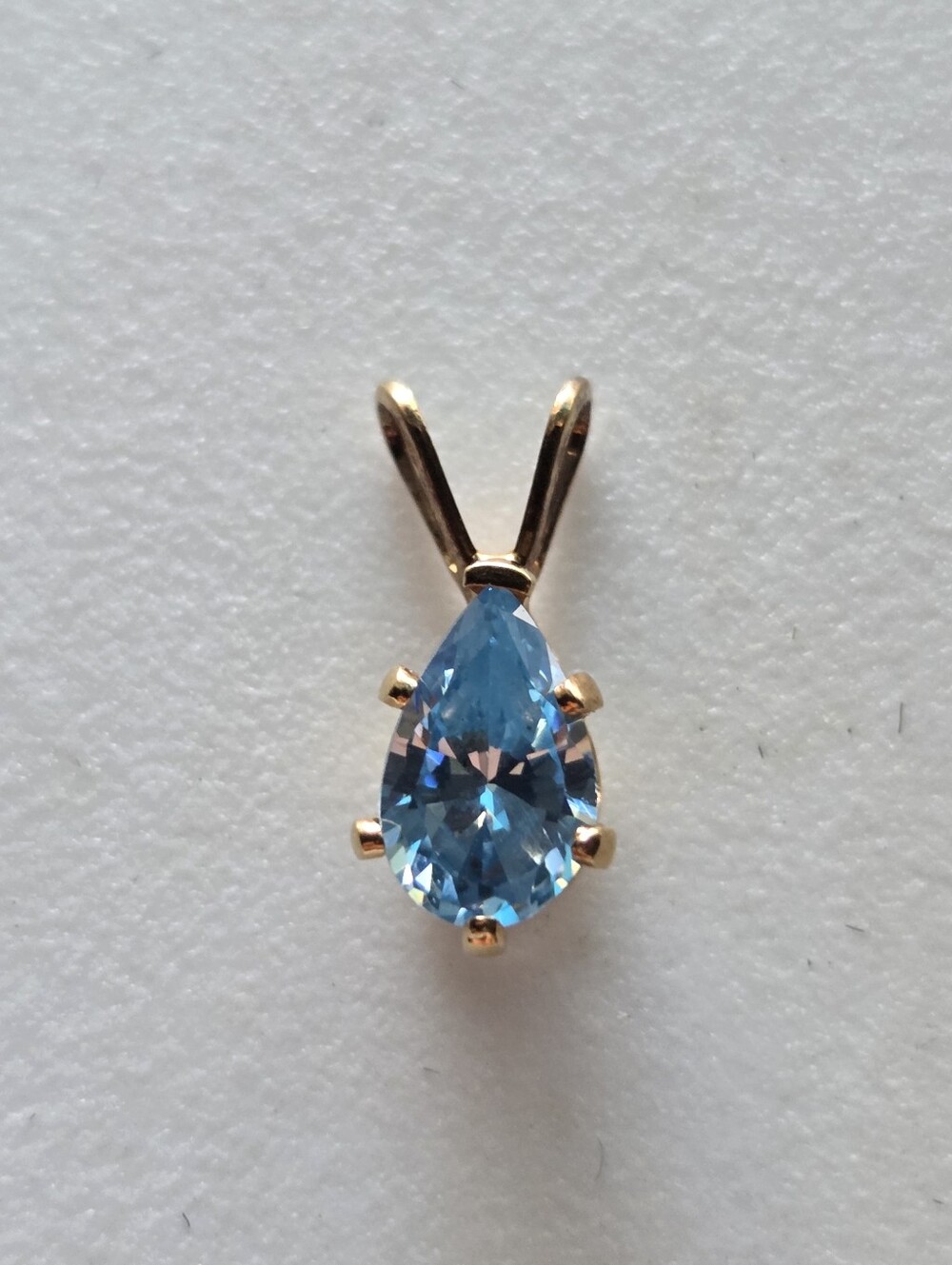 Blue Teardrop Pendant in Gold Setting